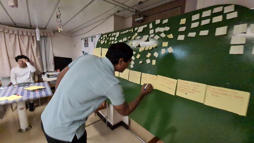Photo from the final wrap-up of the onboard design thinking workshop
