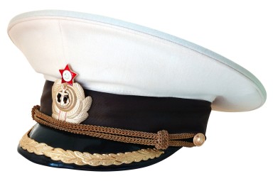 A ship’s Master’s peaked cap, symbolizing the leadership responsibility discussed in the conclusion