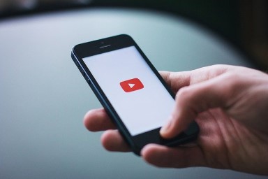 The YouTube logo, cited as the second-largest search engine and a natural home for video-based training content